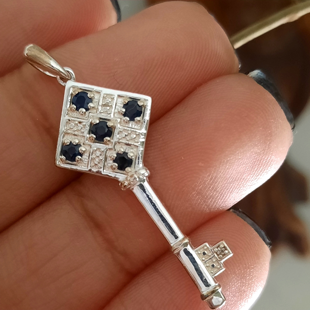 Sterling Silver Key Pendant with Blue Sapphire
